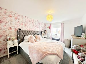 Bedroom One- click for photo gallery